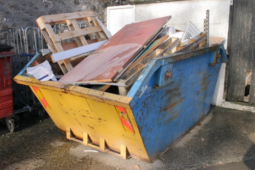 Attic before clearance in Bishops Stortford showing clutter