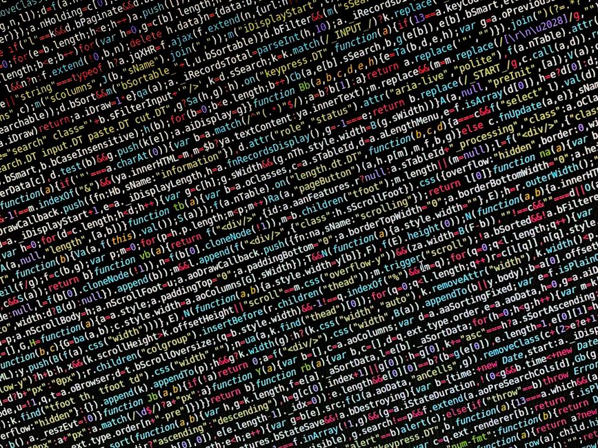 A computer screen displaying a code editor with multiple lines of HTML and CSS code in various colors, including red, green, blue, and purple, on a dark background. The code is slightly blurred, with